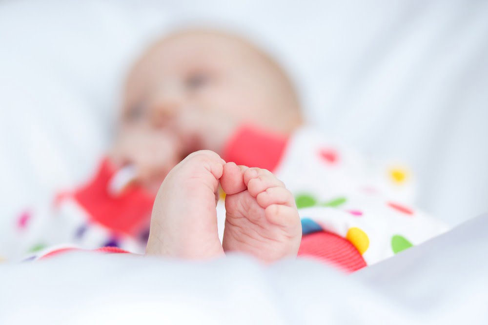 De ce râd bebelușii în somn: 3 motive care îi fac pe cei mici să zâmbească