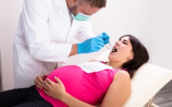 Implantul dentar în sarcină. Este posibil?
